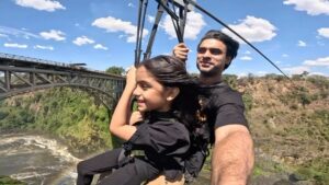 Tovino Thomas Instagram - Izza : My partner in adventure, my first born, my unconditional love, my lifeline. 
When Izza was born I had decided I would be the one to hold her first, always wanted her to have many of her “firsts” with me. And here we are making another first , beating the fear with smiles on our faces and the wind in our hair. Cannot wait to jump into more adventures with you, my precious one.🧿
 #myfirstborn #myadventurepartner #herfirstadventure  #likedadlikedaughter #zambiatozimbabwezipline #victoriafalls #zambeziriver #zimbabwe #zambia #africa