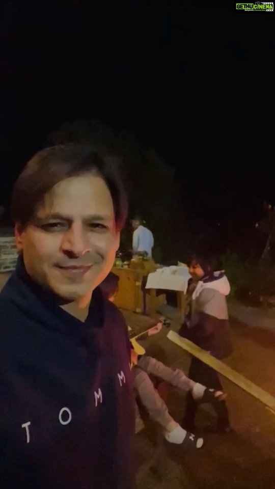 Vivek Oberoi Instagram - These are the moments we live for ✨ Enjoying the family time around a bonfire, toasting marshmallows, playing songs! Golden memories in life ❤ #reelsindia #reelsinstagram #familytime #blessed #love