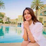 Aarti Chhabria Instagram - “If you’re not blind, you can find fashion everywhere.” ~ Gianni Versace Blissful Living X @palazzoversace 🎊 #blissfulliving #aartisblissfulliving #palazzoversace #palazoversacegoldcoast #goldcoast #whitedress #pool #palms #likedubai #aartichabria #quotes #fashion #luxurylifestyle #holisticwellness #smiling #bliss Palazzo Versace Gold Coast