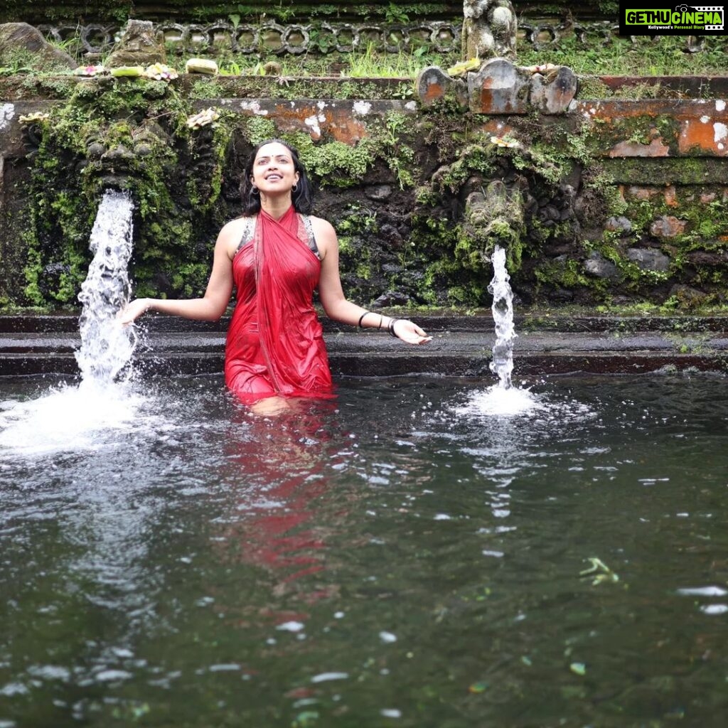 Amala Paul Instagram - Grant me the power of water, to accept what I cannot change. The power of fire, for energy and courage to change the things that I can. The power of air, for the ability to know the difference. Grant me the power of Earth, for the strength to know and walk my path. Blessed Be 🌿🪷🌙 #mahashivratri2023 #holywater #purificationritual #melukat #holyspring #ceremony #abundantserenity #hiddengem #newmoonhealing #bali Pura Gunung Kawi Sebatu