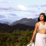 Amala Paul Instagram - ✨🎭 Embracing the Spotlight Again 🌟 Captured by @chathan__ #lightscameraaction #newmoon #travelgram #wanderlust #exploremore #mountainlife #instanature #travelphotography #hikingadventures #exploretheworld #mountainlover #forestvibes