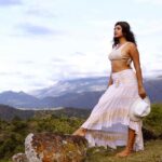 Amala Paul Instagram - ✨🎭 Embracing the Spotlight Again 🌟 Captured by @chathan__ #lightscameraaction #newmoon #travelgram #wanderlust #exploremore #mountainlife #instanature #travelphotography #hikingadventures #exploretheworld #mountainlover #forestvibes