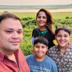 Anasuya Bharadwaj Instagram - Mother Nature doesn’t need a filter.. 🌅..something I look upto 💛🧡 #GoldenHourGlow 🌟🧿 @susank.bharadwaj 👨‍👩‍👦‍👦❤️🧿