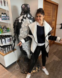Archana Instagram - Day 02 #capetownsouthafrica 
 
On our day tour visited the #penguin colony at Boulders Beach & loved the way no one hushed whistled or bullied the animals by any notice or action … penguins are very private creatures and just love to chill with their tribe … delight to visit their nesting holes by the beach & see them snuggle and huddle with their loved ones … like my tribe is as huddling for pictures with them :D

Don’t miss the #possum sneakily looking towards me in the bushes 🫣🙈🤪
.
.
.
#love #naturephotography #wildlife #beach #travel