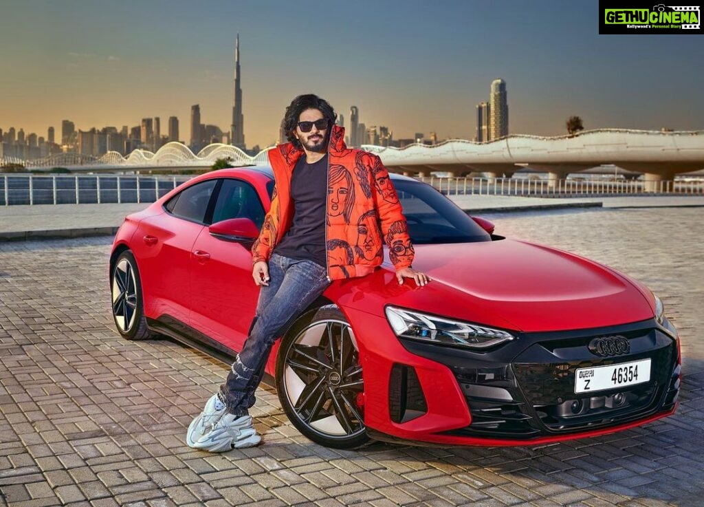 Dulquer Salmaan Instagram - A big bucket list dream come true for me. Featuring on the cover of @topgearmagindia for their 3rd Anniversary Issue. It was a weekend that felt less like work and more like play. I got to fool around at the @dubaiautodrome in an @audiin RS E-Tron GT and a @mclaren GT as part of my job 😱😱 Many thanks to @ramesh_somani and the entire team of TG India for the honour and pleasure that this shoot was. Ramesh you’ve become a friend for life and chatting cars with you the whole time was the best kind of conversations. Thank you for letting me do this. Often times between work I don’t find the time. More of this in the new issue. @visit.dubai Styled by @harmann_kaur_2.0 Photographer @browning_hill Make up @av_ratheeshcinema Hair @saurabhbhatkar