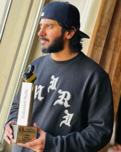 Dulquer Salmaan Instagram - This one felt special ! My first ever award for Hindi. And my first ever for Best Actor in a negative role. Many thanks to the jury of @dpiff_official for this honour and @abhialmish for being such a kind host. 

For some reason my old friend, my nerves got the better of me on stage and I blanked out like a first timer. 

So the one person I truly need to thank for this is Balki sir. I dont know how he saw me as Danny but he did. And the conviction he had in me, his guidance and vision was everything for me. Thank you sir and all my wonderful costars, the best crew and everyone at @hopeprodn for giving me the best experience on #Chup. This one is for all of you 🤗🤗🙏🏻🙏🏻❤️❤️

#unforgettablenight #dpiff2023