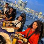 Erica Fernandes Instagram - We loved the experience of dinning in the sky. I loved that they provide you with a little passport of their own before you take flight. Once airborne, You are served appetizers from the cuisine you chose at the time of booking and, after that, a delicious meal. Get the best experience of dinning in the sky with @dinnerintheskyuae. Thank you for the fantastic experience. 🙏 Dinner in the Sky UAE