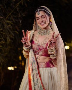 Esha Kansara Instagram - Permission to post solo pictures on our 6 month anniversary 😝 @musicwaala 
.
Trust me this was the most difficult shoot of my life. Sorry and thank you to the lovely photographers at @karmaproduction_india for dealing with my constant shouting and crying while I was getting ready when they were supposed to take “aesthetic beauty shots of the bride” and all I kept yelling at them was “not now” 🤣🙈🙈🙈🙈 and yet I get to post these which was a surprise 😄 I almost thought I had no solo shots of me 🤦‍♀️🙏 JUST IMAGINE 💔
. 
Now for the credits 🌸
Styled by me 🙋🏻‍♀️ (took me almost 4 months and a gazillion references and self doubts) 
Lehenga choli @taruntahiliani 
Dupatta @paithanis.by.mrugakirloskar 
Head dupatta @jiviva_ 
Jewellery is all custom made by my father and a lot of fine artists 🤍
Hair @_hair.by.freya_ 😘
Make up @theglitterboxbyshreyapatel (plz don’t go overseas) 🌸
Draping by my last minute saviour as always @styleitwithniki  assisted by @ishhaa_nagar ❤️❤️
.
#indianwedding #gujaratibride #bigfatgujjuwedding #bridalfashion #taruntahilliani #eshakansara