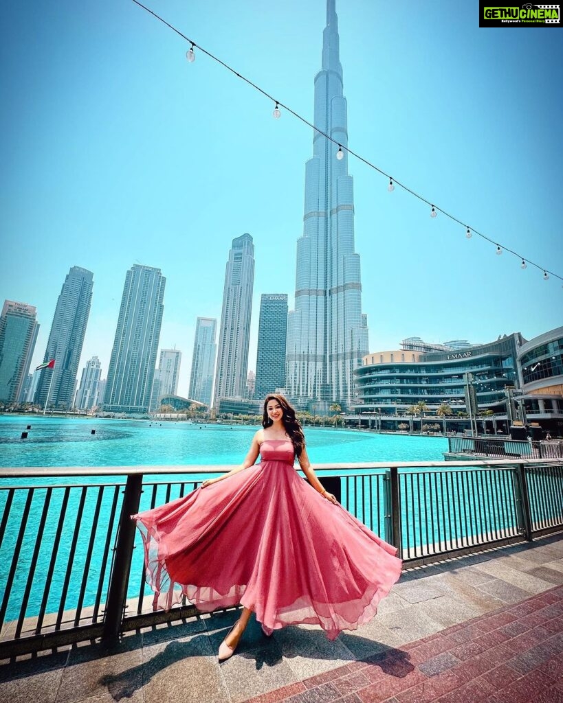 Eshanya Maheshwari Instagram - Now my life is sweet like cinnamon Like a fucking dream I'm living in ✨🫶🏻 Cinderella like dress by @maheshwariswathi Picture credit @bhavikamaheshwari10 📍- @burjkhalifa @thedubaimall #burjkhalifa #dubai #travel #traveldubai #esshanya #esshanyamaheshwari Burj Khalifa, Dubai Fontain