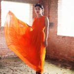 Esther Anil Instagram - 🍊 Wearing the same old orange dress. Makeup and hair @prabin_makeupartist Photo by @evan.anil