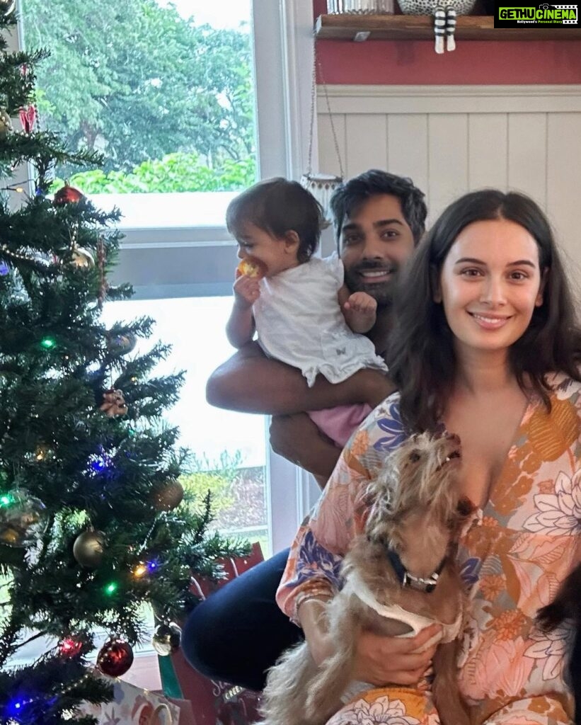 Evelyn Sharma Instagram - Christmas at the Bhindi’s 😅🎄 best we could do for a family photo on #ChristmasEve trying to stop Ava from tipping the tree and Coco from unwrapping the gifts 😅 #family #love #merrychristmas