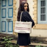 Girija Oak Instagram - Girija Oak Godbole x reCharkha Introducing CHECKS BAG from the Girija x reCharkha Collection! With a special weaving technique used in its Upcycled Handwoven fabric, the Checks Bag is unique in itself. It gives away a chic vibe and your bound to fall in love with the design easily. Check out the brand new Girija x reCharkha Collection only on www.recharkha.org 🔗 Link in bio. Photography: @shailendra_pardeshi Styling: @stylist.chaitalikulkarni HMU : @sheetalpalsande . . #recharkha #girijaoakgodbole #instagram #madeinindia #totebags #slowfashion #sdgs #handmadewithlove #trendingbags #handmadegifts #handcraftedwithlove #totebag #upcyclersofinstagram #shoppingbags  #sustainableliving #designerbags #fashionbloger #sustainablefashion #punebloggersfashion #indianhandicrafts #bloggersofindia   #environmentallyconscious #motherearth #upcycledfashion #consciousfashion