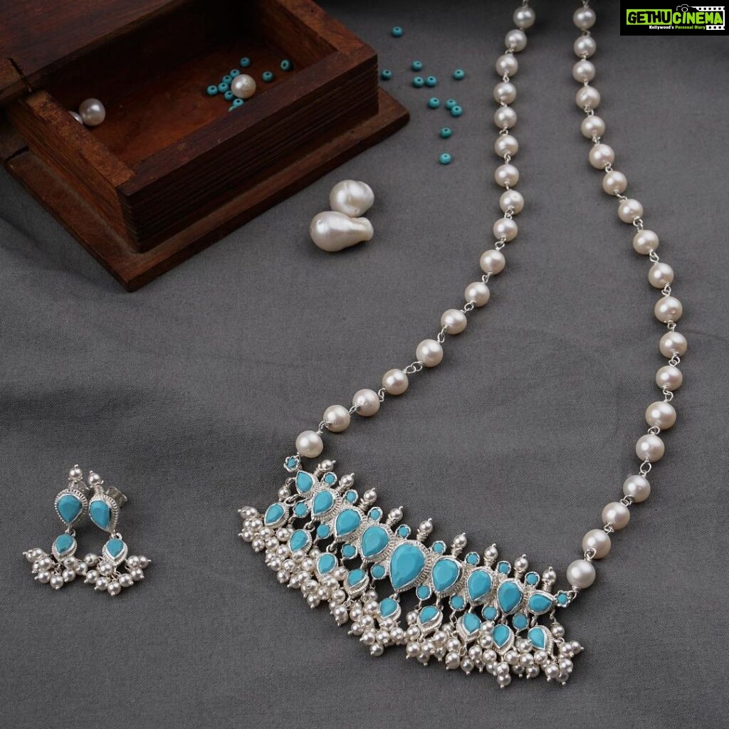 Girija Oak Instagram - A classic & graceful in-house Turquoise Stone Tanmani set with a combination of Freshwater pearls. A classic & authentic piece of jewellery with matching earrings. This gorgeous piece is perfect for the festive season!! Shop online and in-stores. www.aadyaa.com For queries please WhatsApp us at 7219275608 #tanmani #turquoisejewelry #statementjewelry #silvernecklace #aadyaa #handcrafted #silver925 #preciousstones Aadyaa
