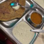 Isha Chawla Instagram - Sharing some pictures and thoughts from our walk to Siddhivinayak temple this morning . We left at 4:45 in the morning and reached at 8:08 am . We went without any breaks covering a distance of slightly over 15kms . This is not really the best weather to be walking on the streets , but I have to say that the weather gods were kind to us . I have been doing this for many years now . Walking to Siddhivinayak at least once a year , normally it’s in the beginning of the year . But 2023 started with a lot of travel , so had to do it around this time . I really enjoy starting my year with this walk … what it brings to my life apart from making Ganpati happy (assuming so ) is a lot many things . To begin with a lil test of grit /determination , as it takes courage to wake up at 3 am and still stick by your decision , in that hour of deep sleep and trust me in this weather walking at 4 am also is pretty exhausting. This excursion also brings to notice the beautiful structures and glory this chaotic city has . The city’s interesting nuances , it’s charming transition from night to dawn from solitude to a sea of people …Every one every thing all at once. The fallen flowers , the broken streets and the footpaths which are now home to so many… reminding you to just look around and be grateful for the abundance in your life . Also upon reaching the temple the folding of hands queuing up for darshan and then asking undeer ( Ganpati ki savari) for all that your heart desires , is a reminder , That struggles should only make one humble not arrogant and no matter where you’re coming from asking for something will not make you small . Then comes my favourite part, that is the mandatory trip to my favourite cafe madras … almost feels like you’ve earned the meal . Heart and tummy both full . #ganpatibappamorya #gratitude