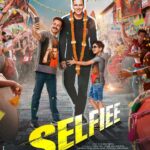 Karan Johar Instagram - Jise aaj tak sirf parde par dekha, kya usse kabhi haqiqat mein mil paayenge ye dono?🤩 #SelfieeTrailer coming out this Sunday, on Jan 22nd! #Selfiee releasing in cinemas on Feb 24th. @akshaykumar @therealemraan @nushrrattbharuccha @dianapenty @apoorva1972 @therealprithvi @supriyamenonprithviraj @iamlistinstephen @raj_a_mehta @rishiwrites @dharmamovies @starstudios #CapeOfGoodFilms @prithvirajproductions @magicframes2011 @anshul300 @playdmfofficial