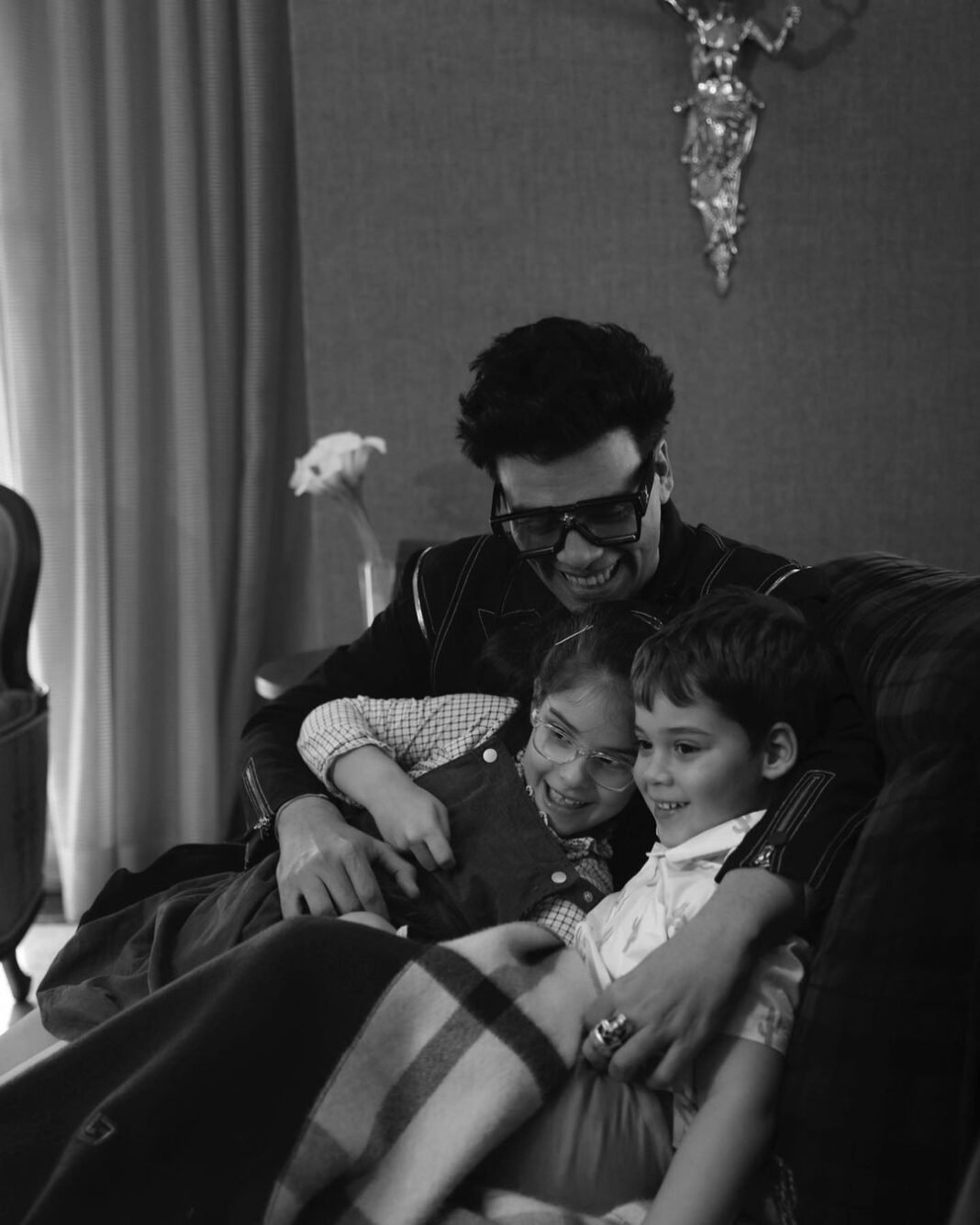 Karan Johar Instagram - Being a parent is not an emotion … it’s an explosion of every emotion you may have experienced …. Words are not the best way to describe the feeling of being a parent… if only cuddles had a language of their own..thank you for shooting these precious images @ishaannair7