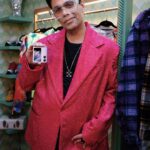 Karan Johar Instagram - I’ve got a new plus one for my red carpet look with the all new #OPPOFindN2Flip, combination of style and fun. Introducing the #BestFlipPhone at ₹89,999* - it’s Flippin’ Fantastic! Going live on 17th March – mark the date!! #SeeMoreInASnap Mood in sync with @Madboymink. #ad #paidpartnership