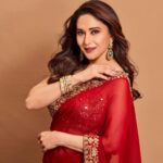 Madhuri Dixit Instagram – Heard melodies are sweet, but those unheard are sweeter! 

#tuesday #tuesdaythoughts #photoshoot #photooftheday #redsaree #sareelove