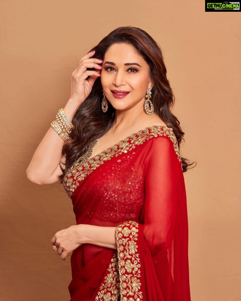 Madhuri Dixit Instagram - Heard melodies are sweet, but those unheard are sweeter! #tuesday #tuesdaythoughts #photoshoot #photooftheday #redsaree #sareelove