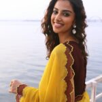 Meenakshi Chaudhary Instagram - Bright and yellow ☀️✨ . . . . . Clicked by : @sampathsharat Styled by: @sumaiah.tabassum Outfit : @reembyshrutiagarwal Jewellery: @houseofqc Rajahmundry
