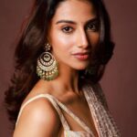 Meenakshi Chaudhary Instagram - Thank you for the love you’re giving to our piece of heart #HIT2 Smiling the brightesttttt for all the love that’s coming in ✨ HIT2 in theatres now! . . . 📸 @pranav.foto Styled by - @riechamallick Outfit by - @dlmayaofficial Jewellery by - @karnikajewelshyd Hmua- @makeuphairbyrahul