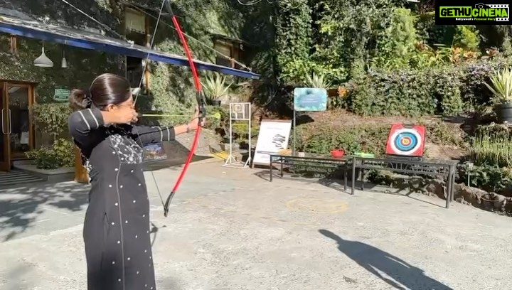 Nadhiya Instagram - Trying my luck with archery 🏹 in between shots as my director @ramesharchi of LGM captures the moment😀 #archery #targetpractice #timepass #newskills #challenge
