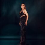 Niyati Fatnani Instagram - STARtle 🌟 Styled by: @praanavsrathod Wearing: @majesticbyjapnah Pc: @nikhil.p.sawant MuH: @celebsmakeupbysejal @makeoverbysejalthakkar . . . . . #startle #morning #blackdress #fashion #thursday #notathrowback #niyatifatnani