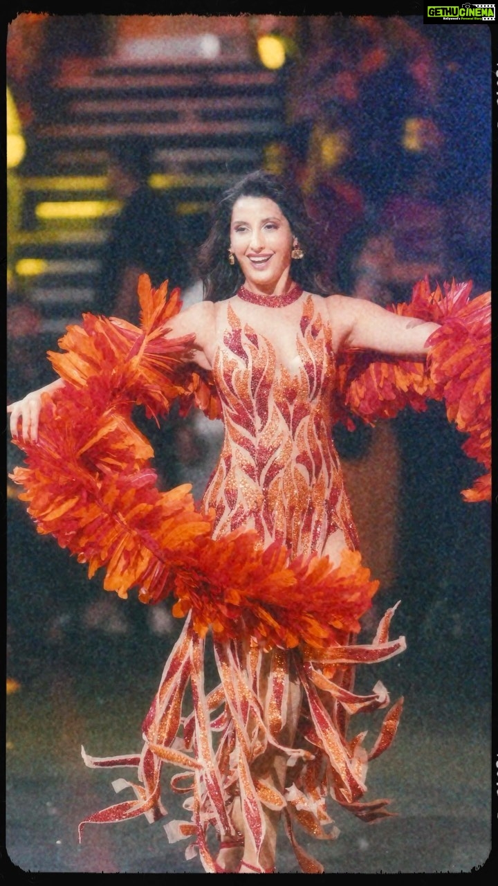 Nora Fatehi Instagram - This beautiful costume for my @iifa performance was made by @abujanisandeepkhosla thank you for making me look STUNNING on stage π€©β₯οΈππ½π₯°β€οΈ Giving Vintage vibes π β€οΈβπ₯ Styled by @aasthasharma Assistant @gehnadholakia Hair @amitthakur_hair Makeup @marianna_mukuchyan π₯ @anups_ @stevenroythomas