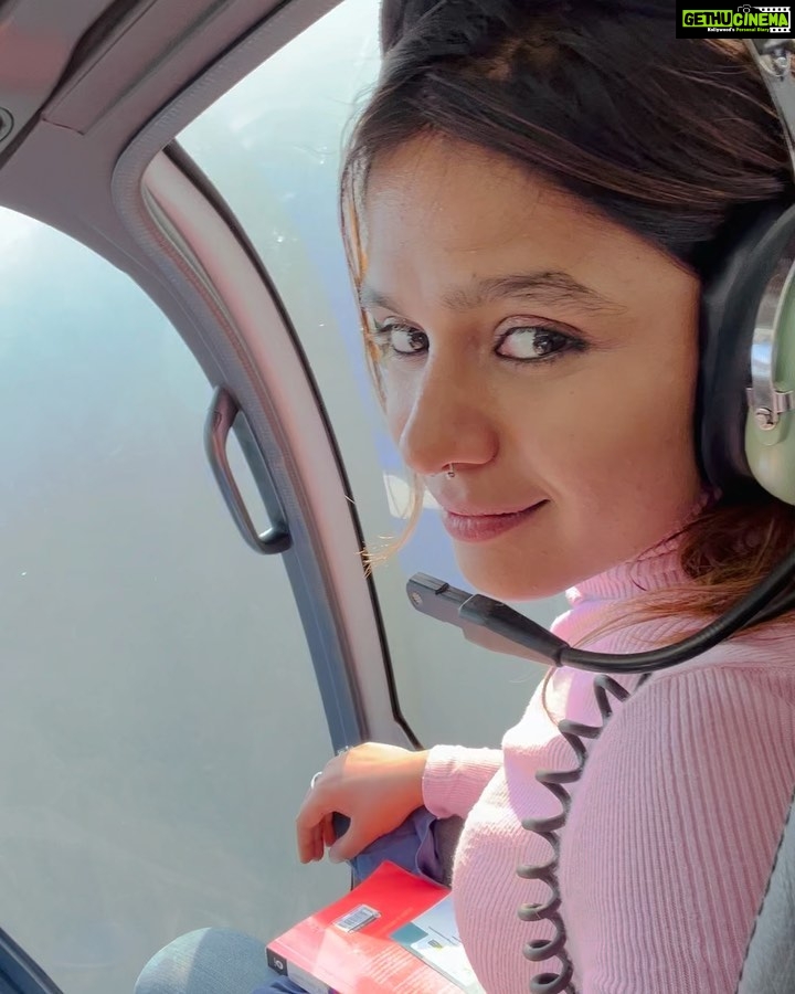 Pranati Rai Prakash Instagram - I had absolutely the best time here!! I wish to learn flying. I remember when asked what I wanted to become in class 6th, I answered fighter pilot…my love for fashion and design grew over time however. And then I thought that as an actor I can actually be all the different people I want to be through my characters. I was soooo happy during the helicopter ride, smiling stunned at the views and butterflies in my stomach! Here’s sharing a few glimpses from the amazing ride. And that’s Capt Pratap Singh, who was flying. 🚁🤍 . . #helicopterride #flying #passenger #love #sky #height #thrill #beauty #mountains #hopefullyfuturepilot #life #sharing #pranatiraiprakash Uttarakhand