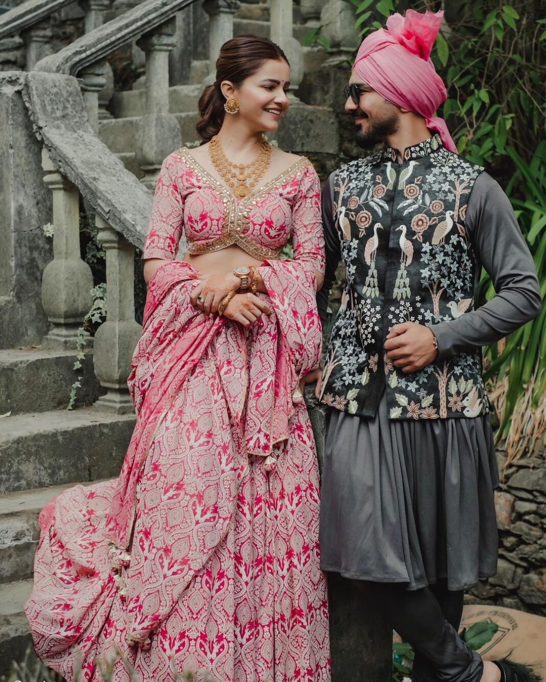 Rubina Dilaik Instagram - We recreated our iconic wedding pic! Same place, same time of the day just 4 years and few months older but much fitter & together ! ❤️❤️ @rubinadilaik Styled by @stylingbyvictor @sohail__mughal___ Pink lehanga @soniyagofficial @megaan.india Me Styled by @stylingbyvictor @sohail__mughal___ Kurta and jacket @attirekunalnsid 📷@raabta.studios