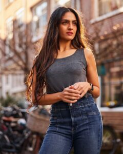 Rukmini Vijayakumar Instagram - Next one in this series…. 

I have been keeping lots of my life away from Instagram. Which is why so many of you think that jeans and a tank are a new look for me. 😊. I wear jeans and tanks and shorts and dresses a lot. 

So many of you have also been asking about my lipstick or skin/ hair care. I’ll share a little bit more than my dance life and training…going forward. 

You’ll be seeing a lot more of life…. And maybe some “new looks” ♥️ (which are not really new for me 😁) 

Photography: @sunnyjagesar 
Location: Amsterdam 
Jeans : @freepeople 
Tank : @marksandspencer 
Lipstick : I think Mocha from @maccosmetics