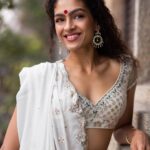 Rukmini Vijayakumar Instagram - Throwback to some pictures that @sunnyjagesar shot…. Will be sharing a few more that are more recent in the next week Clothes @anitadongre #dancer #white #ghagra #lovemylife #indian #indiandance #smile #indianwomen