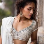 Rukmini Vijayakumar Instagram - Throwback to some pictures that @sunnyjagesar shot…. Will be sharing a few more that are more recent in the next week Clothes @anitadongre #dancer #white #ghagra #lovemylife #indian #indiandance #smile #indianwomen