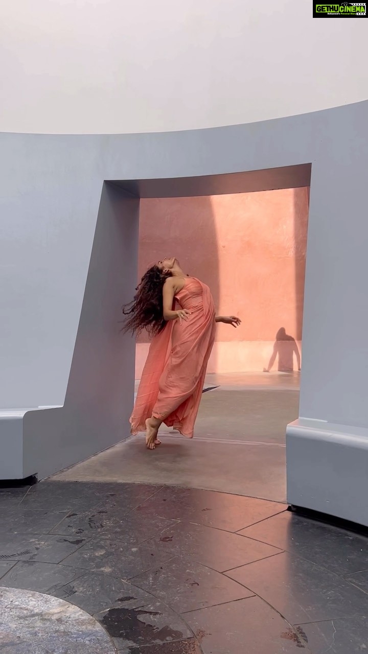 Rukmini Vijayakumar Instagram - Walking slowly, I hear A sound, a trickle, a wail, a whimper. My inner being yearning For what was lost, tis to be found In a space within. I search without, eyes to see Hands to hold, feet to walk, Dismembered I remain A heaviness that pulls To the ground, where I find … I need no eyes, no ears to hear A space that I , carry within My response to the #jamesturrell sculpture #withinwithout When I went to the National museum in Canberra, I learned a lot about the indigenous people of this country. It moved me in a way that I cannot describe … and I wondered how the human race - all of us - could get to a place where we are unable to regard people with varied lifestyles as even human. The indigenous people looked at the earth, the trees, the winds, the water etc as spirits to be treated with reverence. But many of us don’t even regard other humans with respect. I find their culture very similar to the way we see creation in Vedanta. The all pervasive consciousness manifests in creation itself. Therefore everything and everybody is this ‘ishwara’ . The James Turell sculpture embodied both these ideas for me; - A deep respect for the space that one occupies, an idea from the indigenous culture. They refer to it as ‘country’. - And the idea that Purusha, unmanifest, represented in a Shiva lingam, is in fact Prakruthi, creation itself, when manifest. My response to this sculpture is more a feeling of yearning to get back what was lost - A love for ‘country’, harmony with nature, a place to rest, warmth and love for all creatures. This is a struggle that the indigenous people have been fighting. A struggle every one of us must fight within ourselves - to make harmonious living a part of our future. @visitcanberra @australia @pickyourtrail Music : Passengers #dancer #sculpture #love #indigenous #firstaustralians #love #harmony #nature #surrender #besurprised #visitaustralia Canberra, Australian Capital Territory