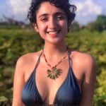 Sanjeeta Bhattacharya Instagram – My sweet guide, Budi made me a necklace out of a leaf as we walked out to the breezy rice fields after wading through the canyon waters of Beji Guwang. As someone who can’t swim properly and to my horror, having slipped inside the watery dark cave (not pictured here since I was busy gasping for air), never have I appreciated sunlight more, I think it shows 🌻

#baliindonesia Beji Guwang Hidden Canyon Trek