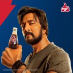 Sudeep Instagram - Baadshah @kichchasudeepa doesn't just sit back and relax. He picks up a Thums Up and stirs up a Toofan instead! ⚡ #SoftDrinkNahinToofan #ThumsUp