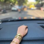 Surbhi Chandna Instagram - The week that went by in pictures 🤎 Aping the dukaan walas expression Mango season calls for my favourite Dessert Mango Sticky Rice Obsessing over the 🐍 wrist watch Borrowed Clothes and my Golden approves 👧🐶 Catch a glimpse of my DULHA Chole Samosa and Meethi Lassi - Cheat Meal Kind enough to share currently listening to - Oat Milk Cold Coffee and Eggs Anyone ?