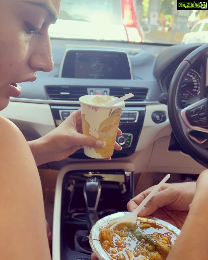 Surbhi Chandna Instagram - The week that went by in pictures 🤎 Aping the dukaan walas expression Mango season calls for my favourite Dessert Mango Sticky Rice Obsessing over the 🐍 wrist watch Borrowed Clothes and my Golden approves 👧🐶 Catch a glimpse of my DULHA Chole Samosa and Meethi Lassi - Cheat Meal Kind enough to share currently listening to - Oat Milk Cold Coffee and Eggs Anyone ?