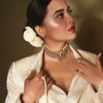 Tejasswi Prakash Instagram - Moving calm 🤍 . . . Styled by: @dollaypop Assisted by: @styledby.siyaaa @xrishikax @garimaaa19 Suit: @labelnishthabansal Potli: @ornatte.in @spiffypublicrelations Jewellery: @vivinia_designer_jewelery @offbeatmediain 📸 @visualaffairs_va