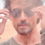Tiger Shroff Instagram – Trying to kick up a desert storm with my fav jam❤️‍🔥🌪️