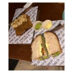 Vaibhavi Shandilya Instagram - Must scroll all the way to the left to see my reaction to this place. In the meanwhile- Virtually indulge in a heavenly feast of flavors and aromas with me at @subkocoffee - from the rich and nutty hazepresso babka to the savory the green one chicken sandwich and bacon and caramelized onion sandwich, to the sweet and satisfying sourdough almond butter toast with sliced bananas. Wash it all down with our refreshing iced coffee (strong) or velvety honey cappuccino. #café #cafelove #coffee #sandwhich #toast #babka #subko #bandra Mumbai, Maharashtra