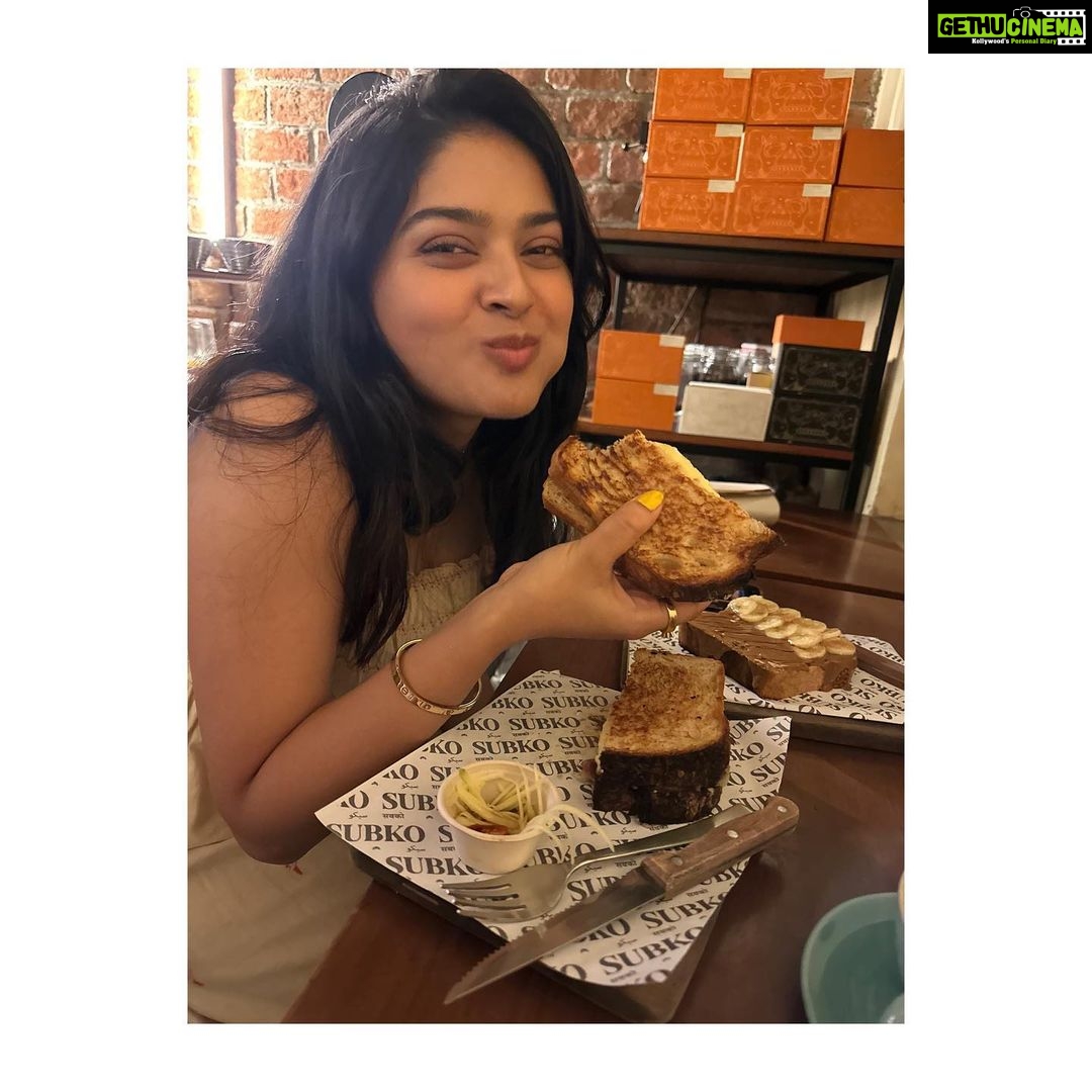 Vaibhavi Shandilya Instagram - Must scroll all the way to the left to see my reaction to this place. In the meanwhile- Virtually indulge in a heavenly feast of flavors and aromas with me at @subkocoffee - from the rich and nutty hazepresso babka to the savory the green one chicken sandwich and bacon and caramelized onion sandwich, to the sweet and satisfying sourdough almond butter toast with sliced bananas. Wash it all down with our refreshing iced coffee (strong) or velvety honey cappuccino. #café #cafelove #coffee #sandwhich #toast #babka #subko #bandra Mumbai, Maharashtra
