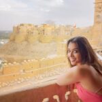 Anupriya Goenka Instagram - Jaisalmer, you have my heart. I am so proud to be an Indian, every place has its own aura and at every corner you are struck with beauty and warmth and loving people who will leave a lasting impression. They just welcome you with an open heart. If you ever go to Jaisalmer, which you must, make sure to stay at @kd_palace_jsm .. I remember we reached at 8pm, me famished and almost starting to get cranky with hunger, as we dint stop anywhere for the want of reaching on time. But the moment we reached the hotel. We were just jumping with joy, it felt like being at home. Nestled within history, smiling faces and a balcony that showed the magnanimity and the humility of the fort. Raj and his father and the whole team, would make you feel at home. Thank you @dev_jaisalmer - we think of you often and miss you. Thank you for showing us what hospitality and warmth is. Hope to see you soon. @jaisalmer_riyasat Wearing my ever so lovely @_shrutisancheti #jaisalmer #heaven #beauty #history #art #love