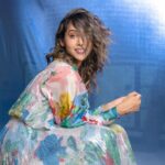 Anupriya Goenka Instagram - Livin in colors..🌸💙💐🌼 I saw this outfit and immediately loved it. Then when I got it I felt it was too bling and needed a bigger event.. Dint even try it for days. Then suddenly one day tried it being sure it will be too much, but it just felt right, colourful, me.. in-fact everyone who saw it loved it. Learning - always try first and never curb your shine.. you just need to be you.. don’t limit yourself according to the space you have.. spread out, maybe the space will expand. Wearing @mandirawirkhq - thank you for being so patient!! 📷 @the.wild.unknown #musings #promotion #asur #mood #fyp