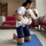 Anurita Jha Instagram - Had seen this happening in videos … Well they don’t let u work out at all… Basss khelte raho … and keep cuddling…🤍😛😛😛 Also wearing the cute and playful tee by @saintandraven ❤️ . . . . . . . . . . . . . . . #love #lovepuppies #puppies #puppiesofinsta #cutebaby #reelsindia #reelsvideo #reelsforyou #funreels #reelitfeelit #reelkarofeelkaro #yoga #yogawithpuppies #