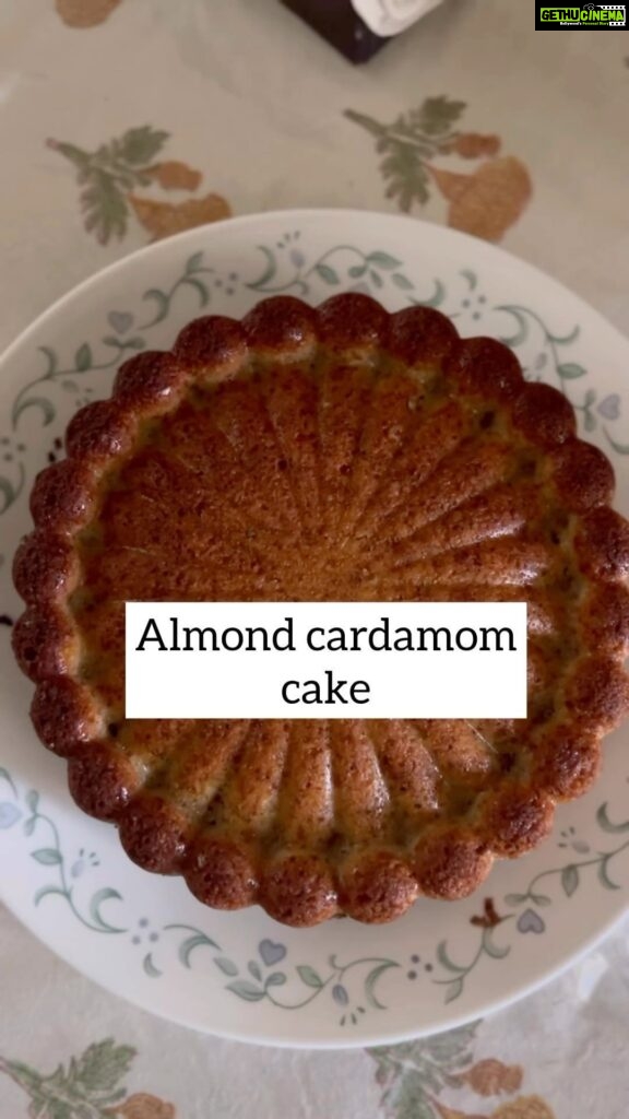Bhanushree Mehra Instagram - Almond cardamom cake ! Treat your taste buds to something special with this quick and easy almond cardamom cake recipe - moist, flavourful and perfect for any occasion !! 1. Preheat your oven to 350°F (180 C). Grease a 9-inch cake pan with butter. 2. In a medium bowl, whisk together the all-purpose flour( one cup) almond flour ( one big tablespoon) baking powder, baking soda, lemon zest and cardamom. Set aside. 3. In a large mixing bowl, cream together the softened butter/ oil and granulated sugar ( one cup) until light and fluffy, about 3-4 minutes. 4. Beat in the eggs one at a time, followed by the vanilla extract. 5. Gradually add the batter to the dry ingredients & mix until just combined, being careful not to overmix. 6. Fold in some crushed almonds 7. Pour the batter into the prepared cake pan and smooth the top with a spatula. 8. Bake for 35-40 minutes, or until a toothpick inserted into the center of the cake comes out clean. 9. Let the cake cool in the pan for 10 minutes before transferring it to another platter. Enjoy your delicious almond cardamom cake