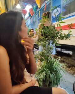 Chandini Tamilarasan Instagram - Traveling😍 It leaves you speechless, then turns you into a storyteller 😍❤️ Thank you @railwaycafehanoi for the amazing food Travel partner @nanda_offl 😜😜 #vietnam #hanoirailwaycafe #hanoitrainstreet #vacay #vacation #holiday2023 #chandinitamilarasan #chandini #hanoi #photodump Hanoi Train Street