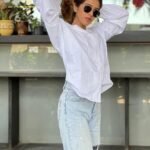 Fenil Umrigar Instagram - happy happy day🌻 Shirt : @allaround.in Denim : @vaire.official 🕶️: @rayban 👟: @zara 📍: @glocaljunction