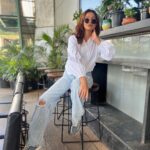 Fenil Umrigar Instagram - happy happy day🌻 Shirt : @allaround.in Denim : @vaire.official 🕶️: @rayban 👟: @zara 📍: @glocaljunction
