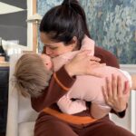 Freida Pinto Instagram - Are there any other Mamas out there who can’t resist your baby’s cheeks even when your babe has had enough of your kisses? The irresistible nature of babies cheeks …